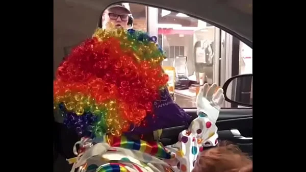 Clown gets dick sucked while ordering food