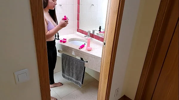 Stepsister receives facial cumshot through a hole in the sink