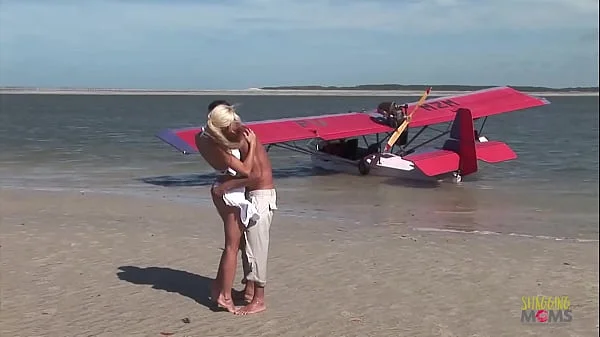 Passionate fucking on the beach with a stunning blonde with big tits