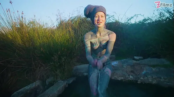 Alternative couple having wild outdoor sex in outdoor hotbath