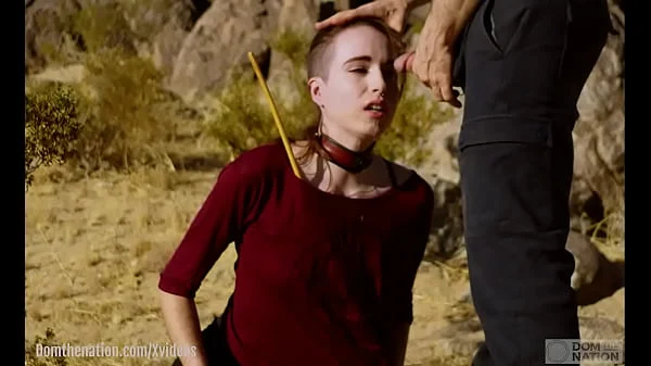 Petite, hardcore submissive masochist Brooke Johnson drinks piss, gets a hard caning, and get a severe facesitting rimjob session on the desert rocks of Joshua Tree in this Domthenation documentary