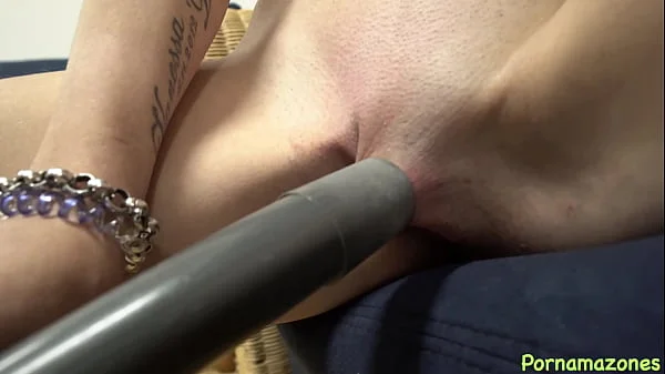Czech brunette plays with vacuum cleaner