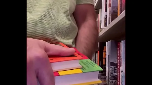 Jerking off at the bookstore. Public masturbation