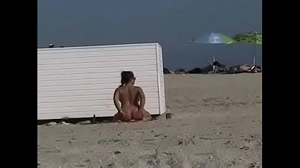 Exhibitionist Wife 19 - Anjelica teasing random voyeurs at a public beach by flashing her shaved cunt!