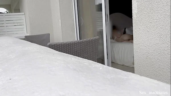 Hot spanish girl was secretly filmed in her hotel room through the window while she was taking some nude photes.